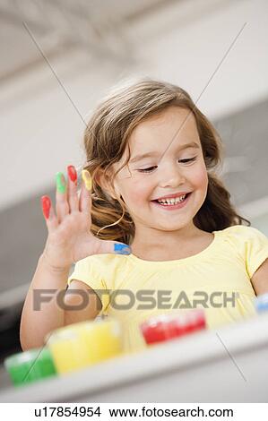 young girl playing with colours View Large Photo Image Picture - young girl playing with colours. Fotosearch