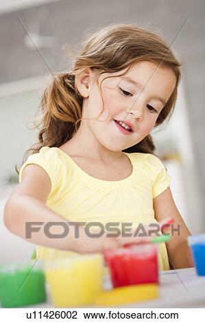 young girl playing with colours View Large Photo Image Stock Image - young girl playing with colours. Fotosearch