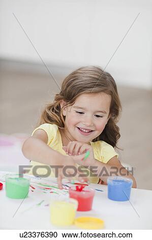 young girl playing with colours View Large Photo Image Stock Image - young girl playing with colours. Fotosearch