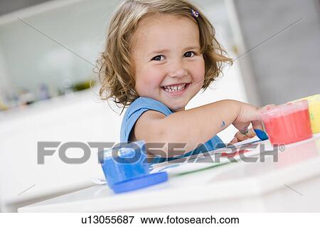young girl playing with colours View Large Photo Image Stock Photo - young girl playing with colours. Fotosearch