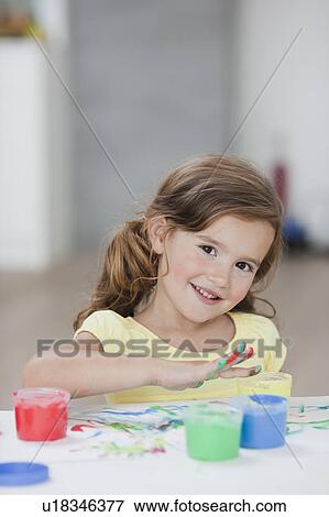 young girl playing with colours View Large Photo Image Stock Photo - young girl playing with colours. Fotosearch