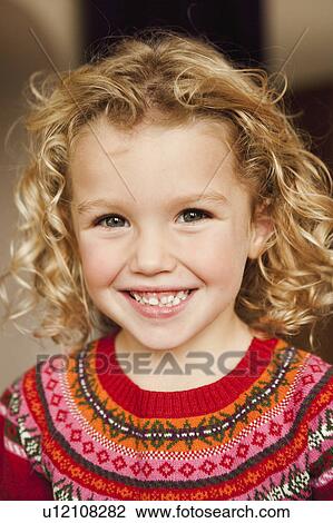 young girl smiling at viewer View Large Photo Image Stock Image - young girl smiling at viewer. Fotosearch