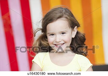 young girl smiling at viewer View Large Photo Image Stock Image - young girl smiling at viewer. Fotosearch