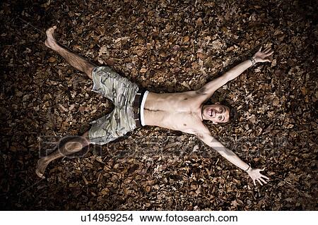 Picture - Young man enjoying nature. Fotosearch