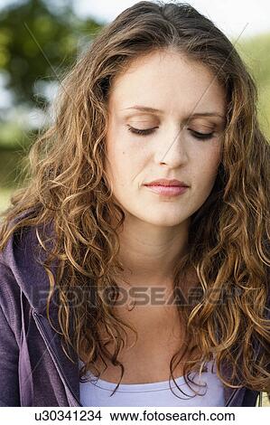 young woman in park View Large Photo Image Picture - young woman in park. Fotosearch
