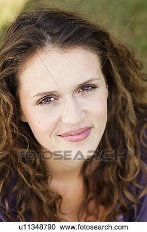 young woman looking at camera View Large Photo Image Stock Image - young woman looking at camera. Fotosearch