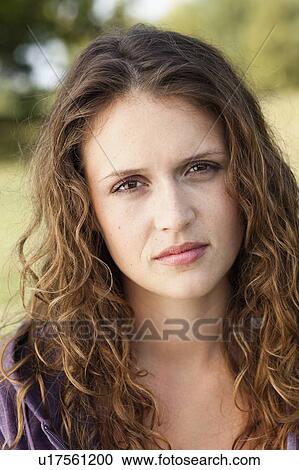Stock Image - young woman sad. Fotosearch