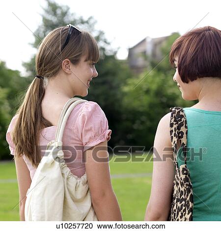 2 young women with bags View Large Photo Image Stock Image - 2 young women with bags. Fotosearch