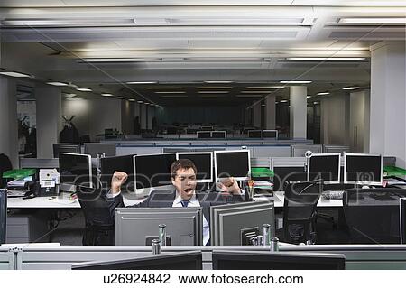 A business man working late, yawning View Large Photo Image Stock Image - A business man working late, yawning. Fotosearch