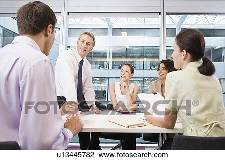 A corporate business meeting View Large Photo Image Stock Image - A corporate business meeting. Fotosearch