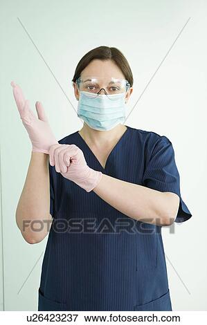 Stock Photo - A female surgeon or nurse. Fotosearch