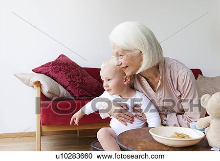 A grandmother talking to her grandson View Large Photo Image Stock Image - A grandmother talking to her grandson. Fotosearch