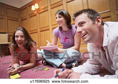 Stock Photography - A group listening to a speaker. Fotosearch
