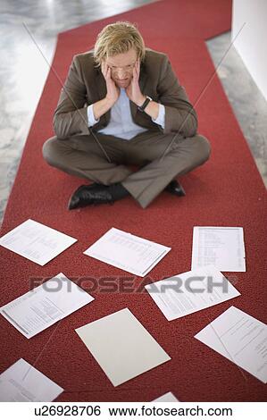 A Mid-40 Businessman is despaired View Large Photo Image Stock Photograph - A Mid-40 Businessman is despaired. Fotosearch