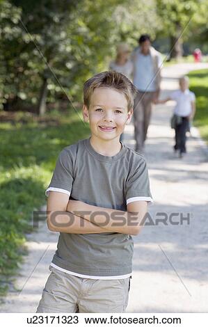 A portrait of a boy in the park View Large Photo Image Stock Image - A portrait of a boy in the park. Fotosearch