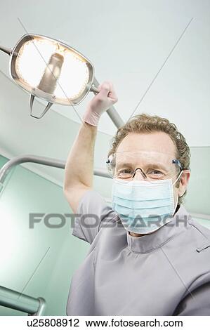 Stock Image - A portrait of a dentist. Fotosearch