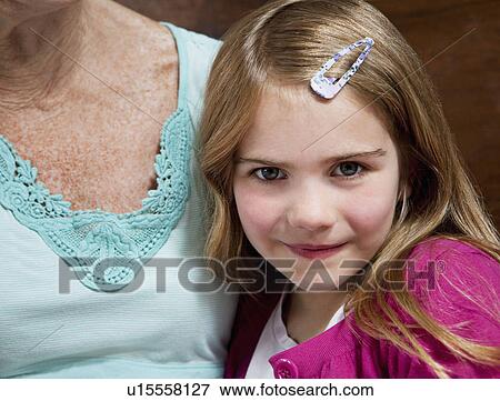 A portrait of a young girl smiling View Large Photo Image Stock Photo - A portrait of a young girl smiling. Fotosearch