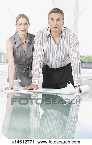 A portrait of two business people View Large Photo Image Stock Image - A portrait of two business people. Fotosearch