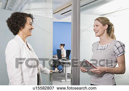 Stock Photo - A teacher and adult pupil. Fotosearch