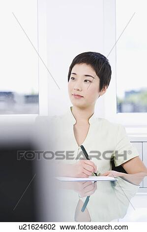 A young asian businesswoman View Large Photo Image Stock Image - A young asian businesswoman. Fotosearch