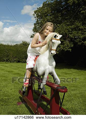 girl on rocking horse