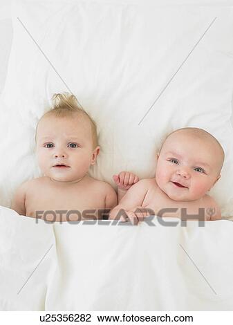 babies in bed View Large Photo Image Stock Image - babies in bed. Fotosearch