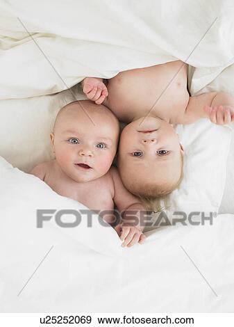 babies in bed View Large Photo Image Stock Photo - babies in bed. Fotosearch