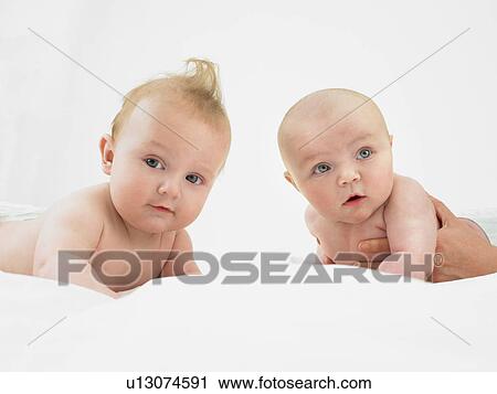 babies lifting head View Large Photo Image Stock Image - babies lifting head. Fotosearch
