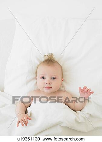 baby in bed View Large Photo Image Stock Image - baby in bed. Fotosearch