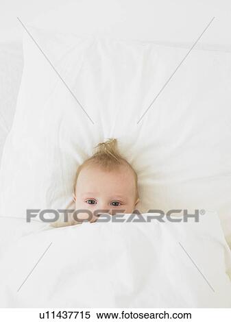 baby in bed View Large Photo Image Stock Photography - baby in bed. Fotosearch