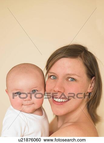 baby in mothers arms View Large Photo Image Stock Image - baby in mothers arms. Fotosearch