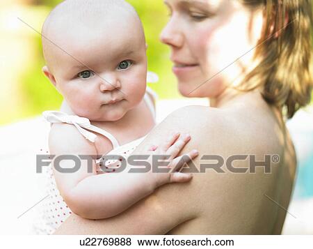 baby in mothers arms View Large Photo Image Stock Photo - baby in mothers arms. Fotosearch
