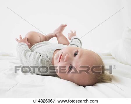 baby on back View Large Photo Image Stock Photo - baby on back. Fotosearch