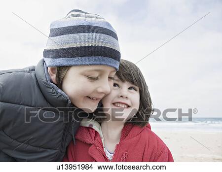 Picture - Boy & girl hugging. Fotosearch
