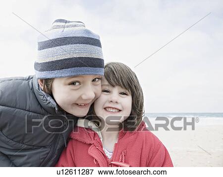 Boy & girl smiling View Large Photo Image Stock Photo - Boy & girl smiling. Fotosearch