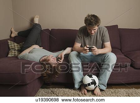 Boys using mobile phones View Large Photo Image Stock Photo - Boys using mobile phones. Fotosearch