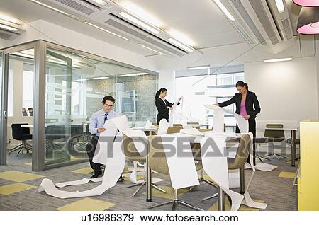 Stock Photo - Business colleagues search computer data. Fotosearch