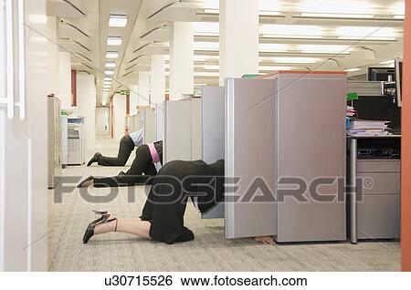 Stock Photograph - Business folk searching store cupboards. Fotosearch
