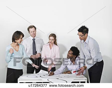 Stock Photo - Business group brainstorm. Fotosearch