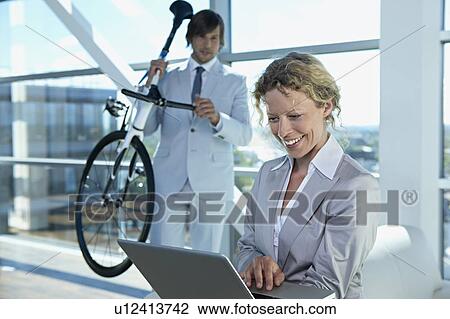 business man and woman with computer View Large Photo Image Stock Image - business man and woman with computer. Fotosearch