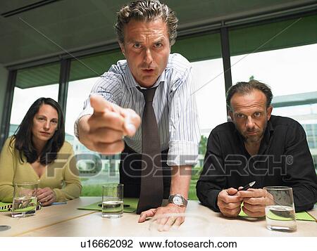 Business man angry with coworker View Large Photo Image Stock Image - Business man angry with coworker. Fotosearch