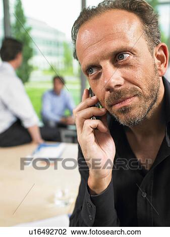 Business man on the phone View Large Photo Image Stock Image - Business man on the phone. Fotosearch