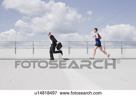 Stock Photo - business man running from jogger. Fotosearch