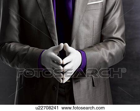 Business man wearing rubber gloves View Large Photo Image Stock Image - Business man wearing rubber gloves. Fotosearch