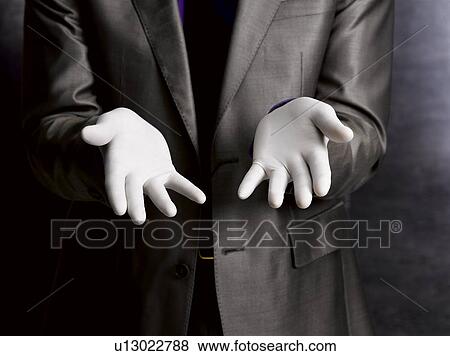 Business man wearing rubber gloves View Large Photo Image Stock Photo - Business man wearing rubber gloves. Fotosearch