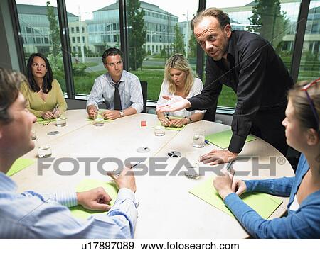 Business man with coworkers View Large Photo Image Stock Photo - Business man with coworkers. Fotosearch