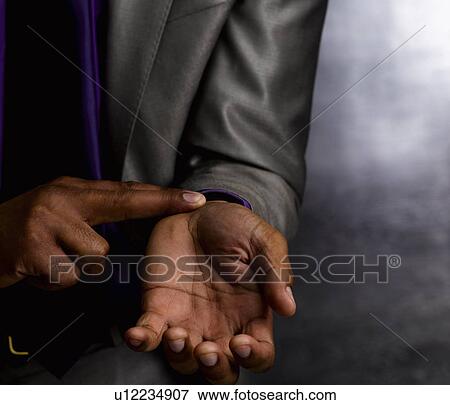 Business man with finger on pulse View Large Photo Image Stock Photo - Business man with finger on pulse. Fotosearch