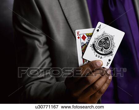 Business man with playing cards View Large Photo Image Stock Photo - Business man with playing cards. Fotosearch