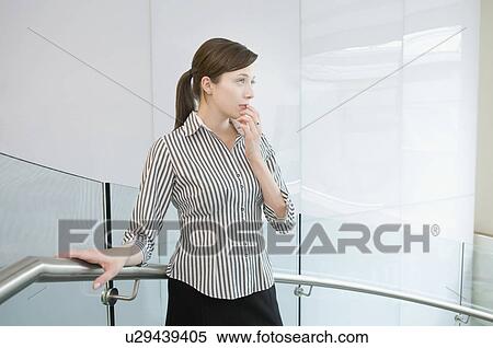 Business woman deep in thought View Large Photo Image Stock Photography - Business woman deep in thought. Fotosearch