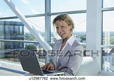 business woman with computer View Large Photo Image Stock Image - business woman with computer. Fotosearch